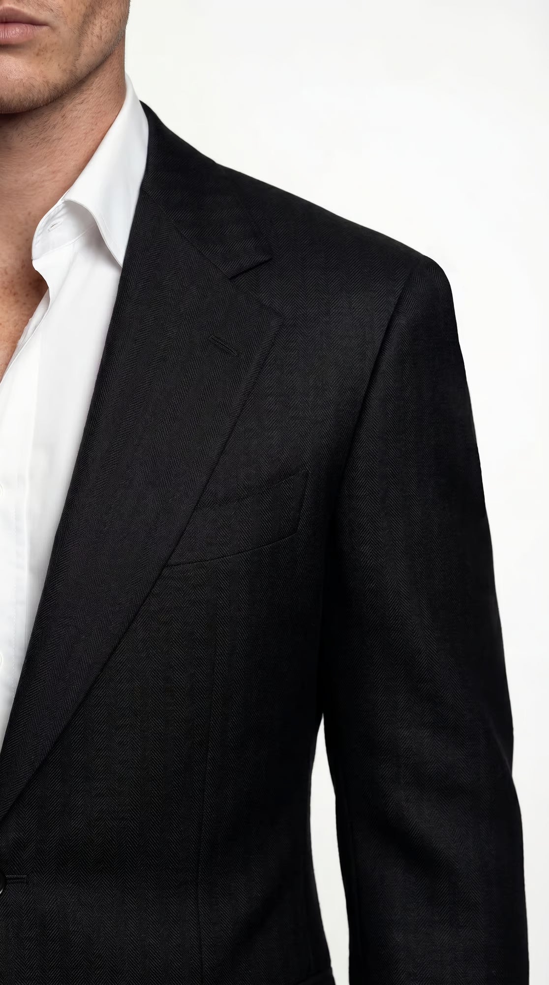 The Foundation Black Herringbone Suit