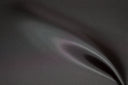 Close-up of dark gray bemberg fabric with a subtle texture